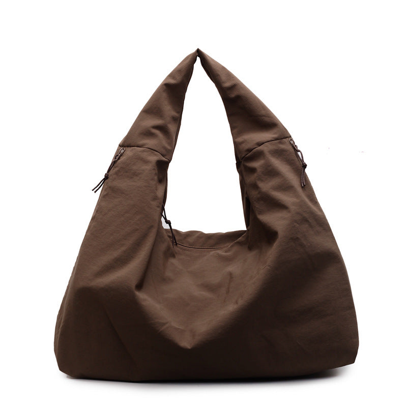 <font dir="auto" style="vertical-align: inherit;"><font dir="auto" style="vertical-align: inherit;">Trendy en elegante schoudertas met grote capaciteit, geschikt voor grensoverschrijdend gebruik, nieuwe stijl 2025, modieuze nylon schoudertas, retro handta