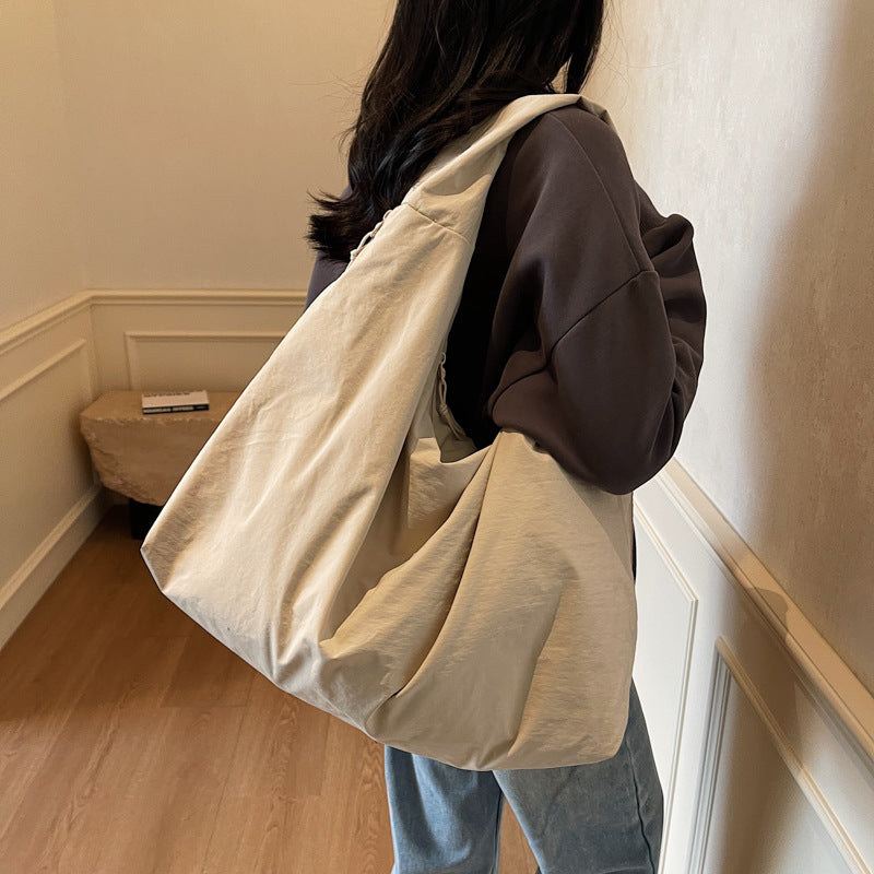<font dir="auto" style="vertical-align: inherit;"><font dir="auto" style="vertical-align: inherit;">Trendy en elegante schoudertas met grote capaciteit, geschikt voor grensoverschrijdend gebruik, nieuwe stijl 2025, modieuze nylon schoudertas, retro handta