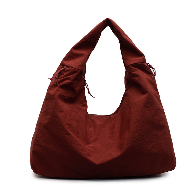 <font dir="auto" style="vertical-align: inherit;"><font dir="auto" style="vertical-align: inherit;">Trendy en elegante schoudertas met grote capaciteit, geschikt voor grensoverschrijdend gebruik, nieuwe stijl 2025, modieuze nylon schoudertas, retro handta